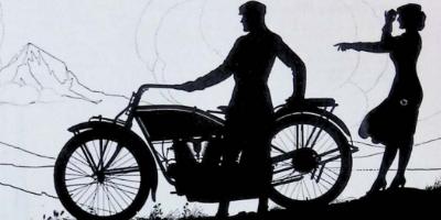 black and white silhouette of a man & his motorcycle and woman from the 1800s